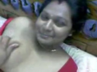 Indian sexy Desi Aunty In Red Dress