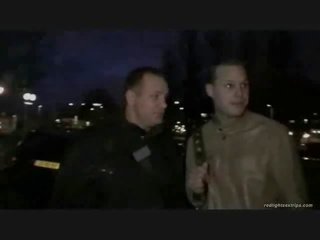 A tourist gets a guided tour through Amsterdam, ending up in the Red Light district where a Blond street girl is waiting for